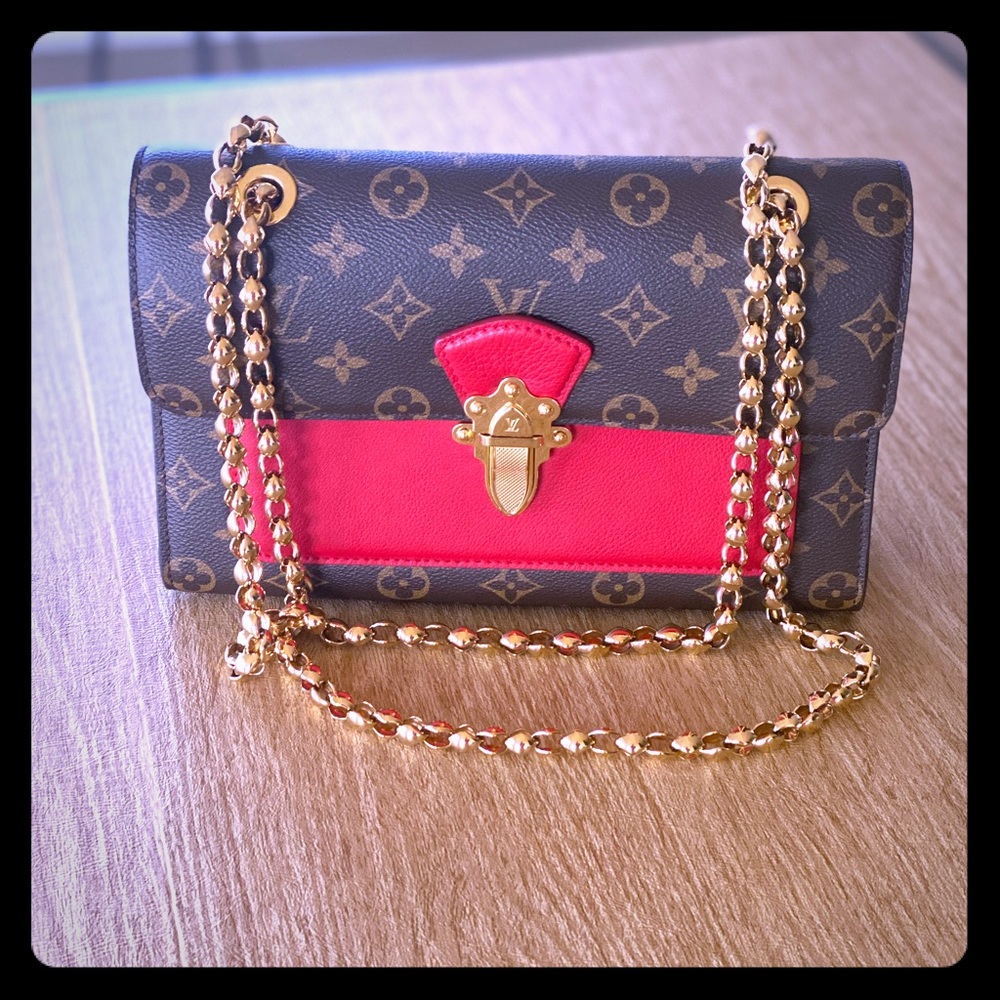 Louis Vuitton handbag “The Victoire MNG Cerise”